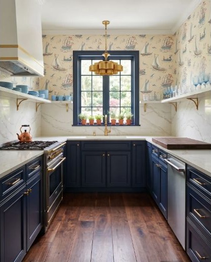 Navy kitchen cabinets tested beside pale decorative surfaces and warm accents.