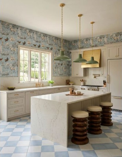 Off-white cabinetry paired with pale-blue botanical wallpaper and a blue-and-white checked floor.