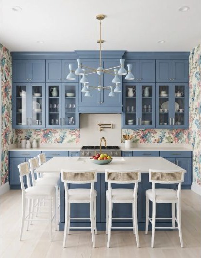 A large family kitchen island with storage and work space on several sides.