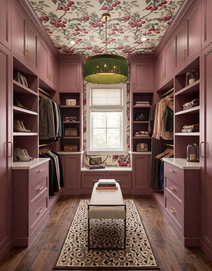 Plum-and-olive walk-in closet with open shelves, hanging, and a fringe light fixture.