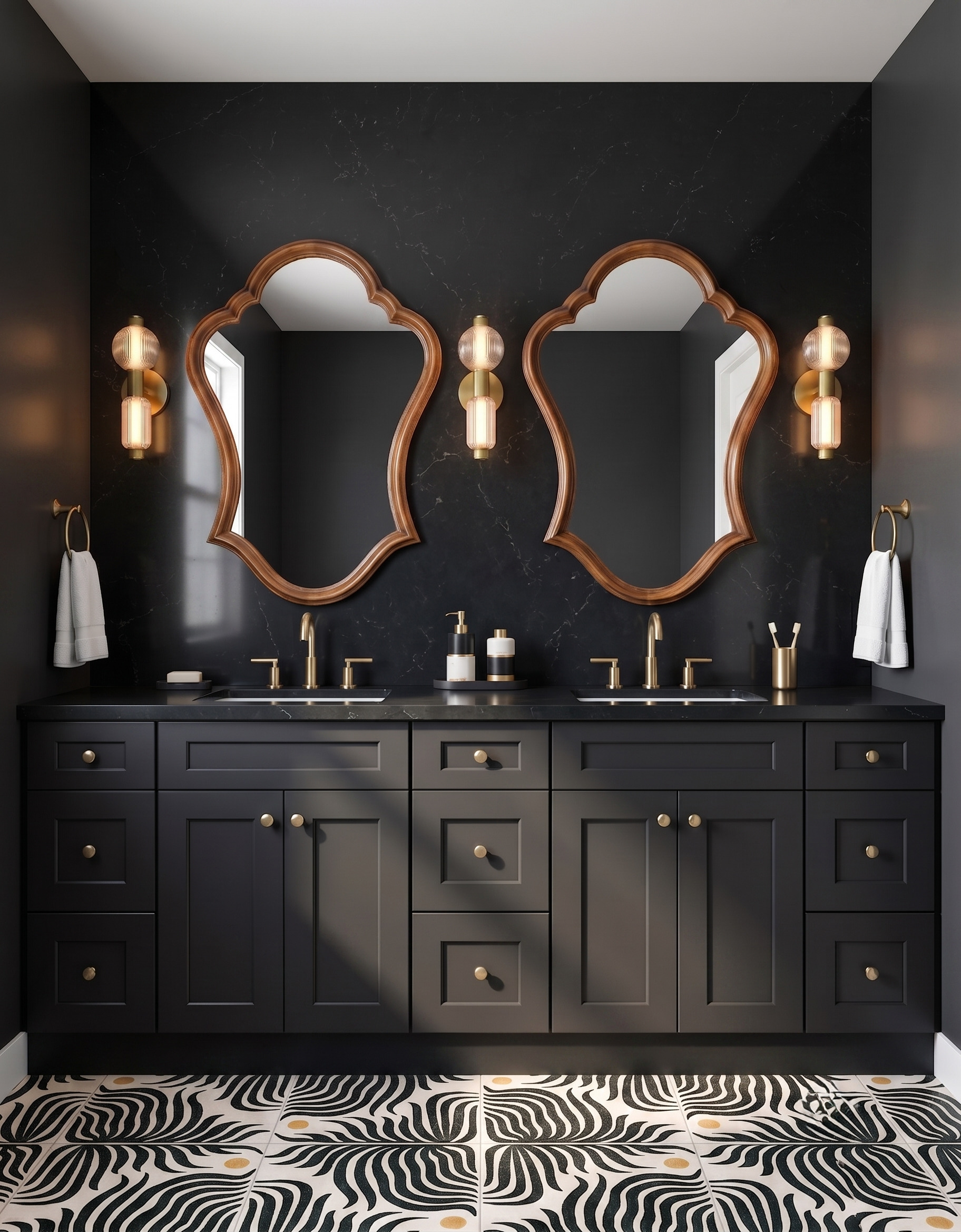 Black double vanity beneath curved wood-framed mirrors and ribbed glass sconces, with a black-and-white patterned floor.