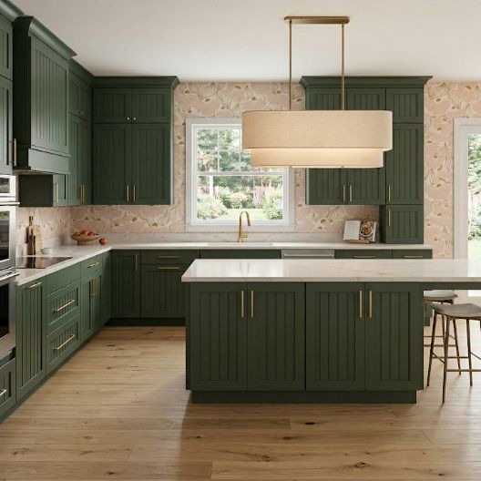 Forest-green kitchen cabinets bringing a deep natural color into a calm interior.
