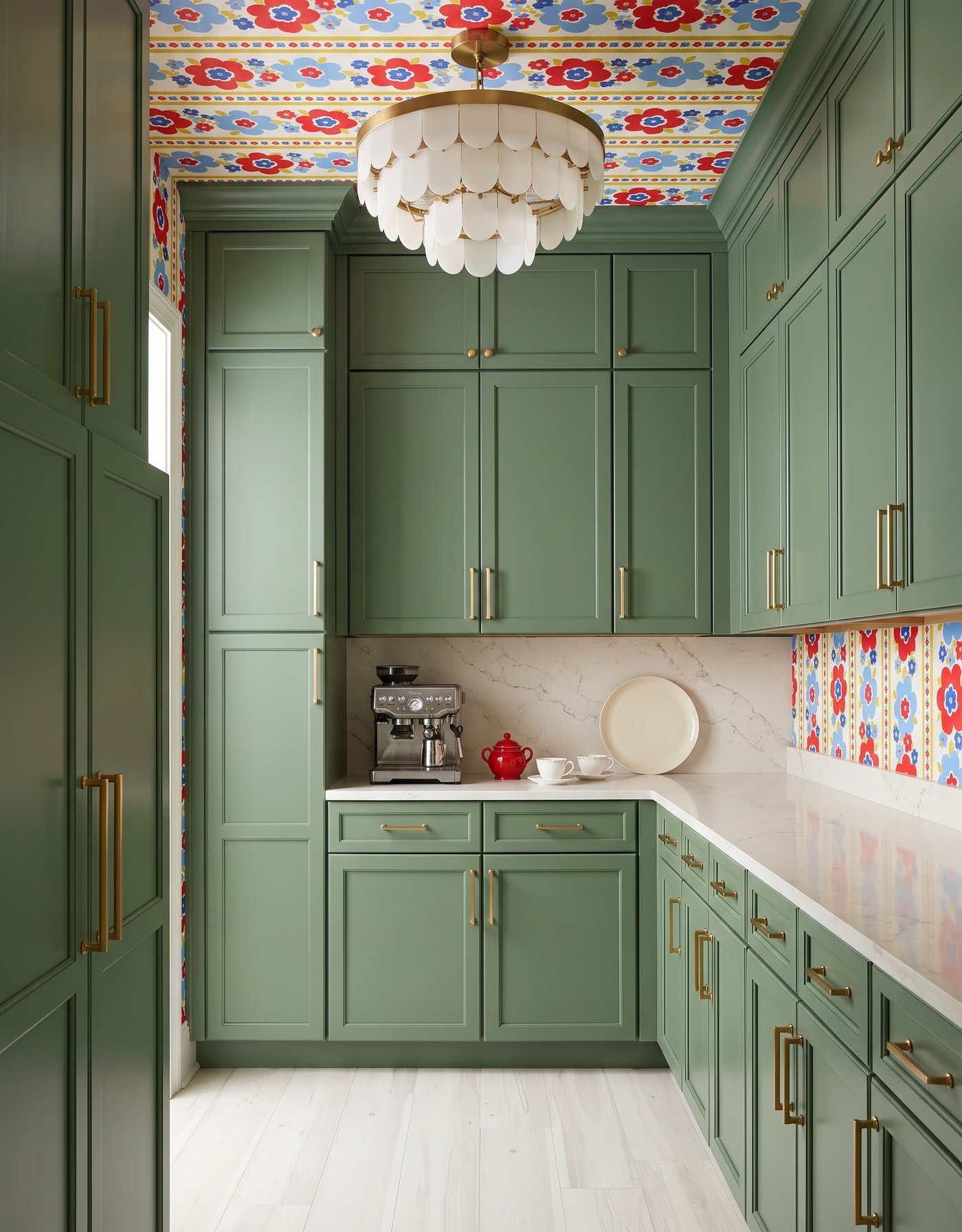 AI-created concept: Moss-green pantry cabinets anchor a retro red-and-blue floral ceiling and cream tiered light.
