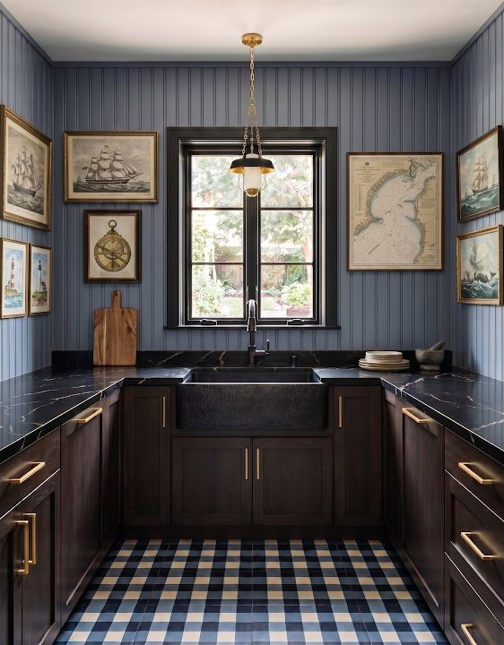 Concept image of a smoky blue and dark wood kitchen with a blue checked floor, dark counters, and a centered window.