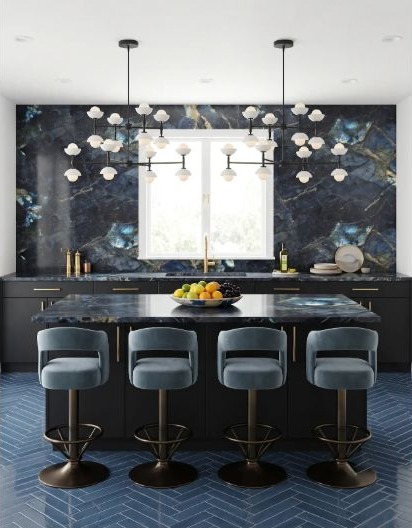 A modern kitchen with long work surfaces and a distinct preparation zone.