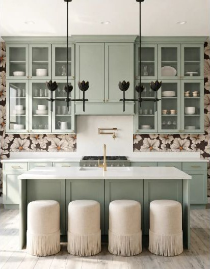 Sage and off-white cabinetry with visible end panels, trim, and transitions.