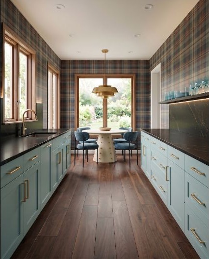 Aqua kitchen cabinets framed by warm wood window trim and dark patterned walls.