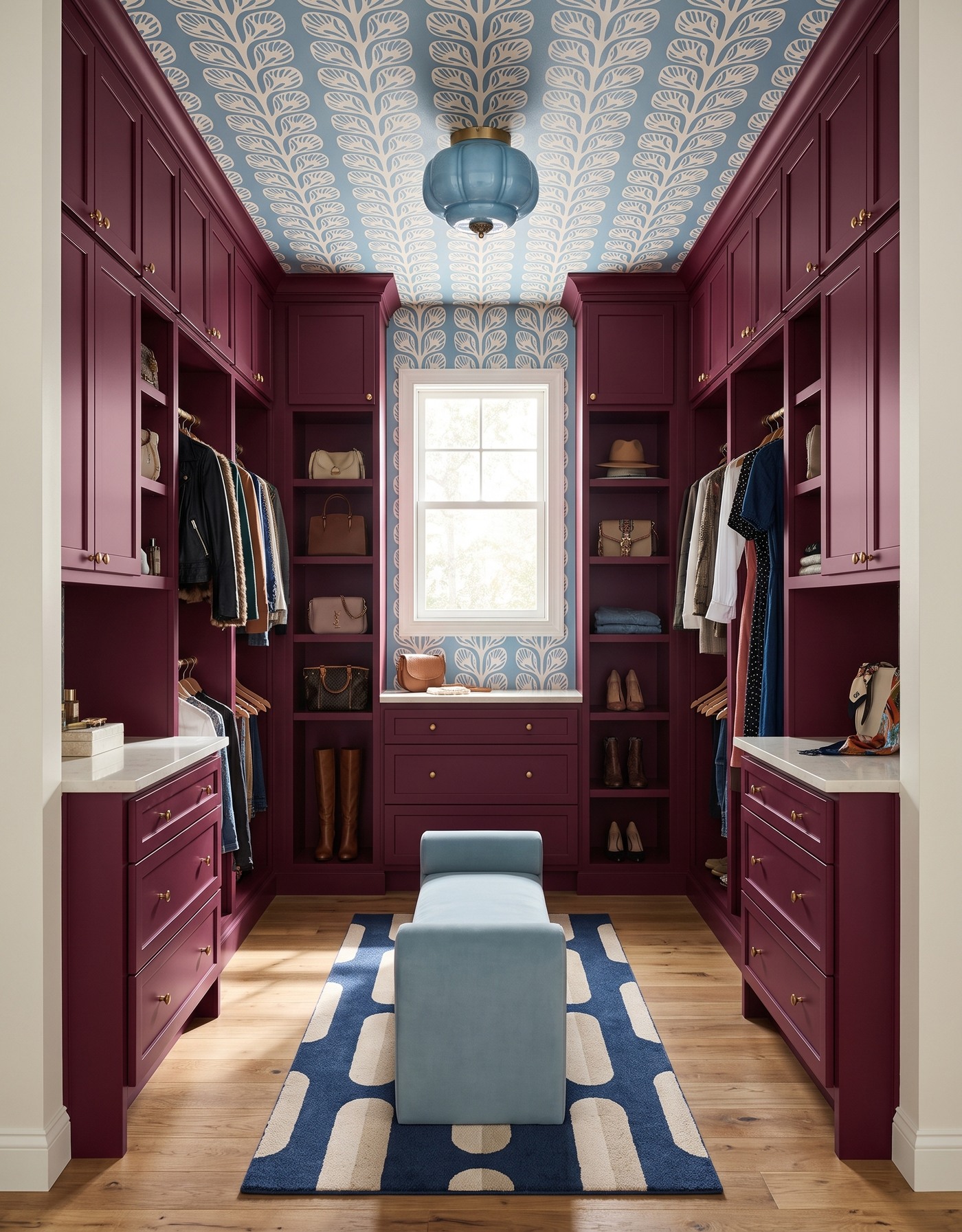AI-created concept: Berry walk-in closet with blue-and-cream leafy ceiling wallpaper, a pale-blue bench and a blue capsule-pattern runner.
